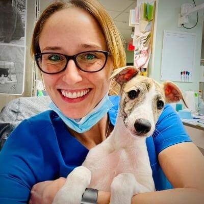 dr. morgan pearl holding a dog